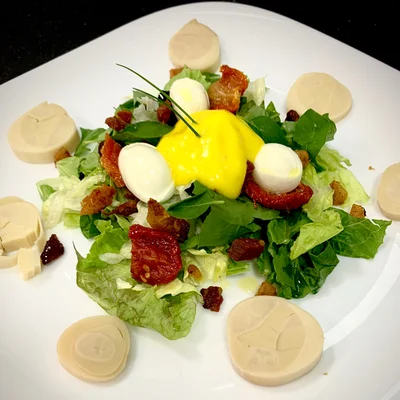 Receita de Salada de folhas com tomate seco e palmito, molho de manga.cebolinha  no site de receitas DeliRec