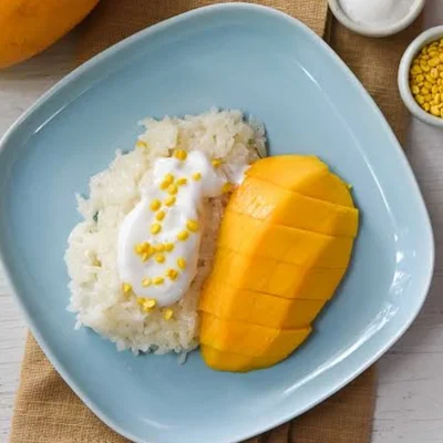 Receta de Arroz pegajoso con mango (Khao Niew Mamuang) en el sitio web de recetas de DeliRec
