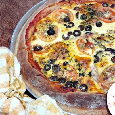 Receita de Pizza Caseira saborosa  no site de receitas DeliRec