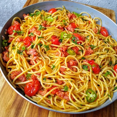 Receta de espaguetis a la sartén en el sitio web de recetas de DeliRec