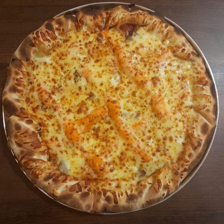 Foto da Pizza 4 queijos  - receita de Pizza 4 queijos  no DeliRec