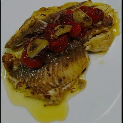 Recipe of Filet of Tilapia with Tomato Confit on the DeliRec recipe website
