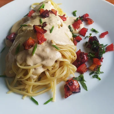 Recipe of Linguini in cheese sauce with toasted tomatoes on the DeliRec recipe website