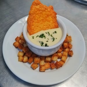 2 cheese sauce with croutons and parmesan croquettes