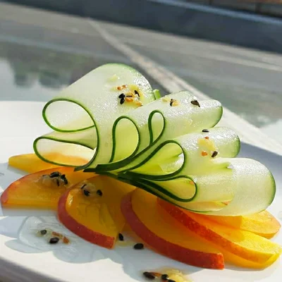 Recipe of British peach 🍑 and cucumber 🥒 salad with sesame dressing with olive oil and lemon on the DeliRec recipe website