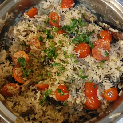 Recipe of Rice with mushrooms, leeks and cherry tomatoes on the DeliRec recipe website