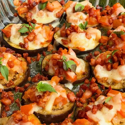 Recipe of Eggplant disks with tomato & bacon on the DeliRec recipe website