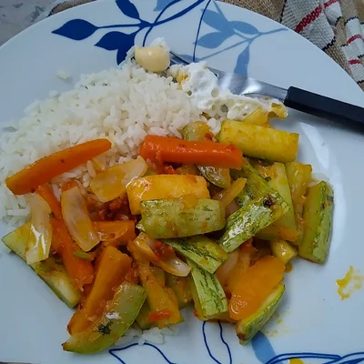 Recipe of Braised Zucchini accompanied by rice on the DeliRec recipe website