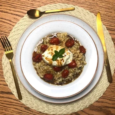Recipe of Parmesan risotto with tomato confit and burrata on the DeliRec recipe website