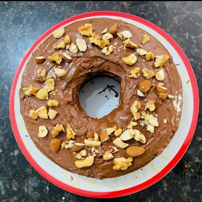 Recipe of Banana cake with chocolate and mixed nuts on the DeliRec recipe website