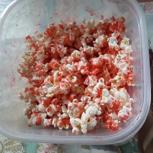 Popcorn with strawberry sauce..