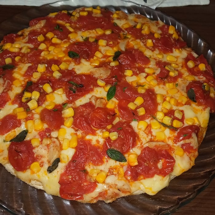 Foto aus dem Pizza mit Tomaten-Confit-Teig - Pizza mit Tomaten-Confit-Teig Rezept auf DeliRec