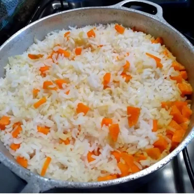 Recipe of White rice in carrots on the DeliRec recipe website