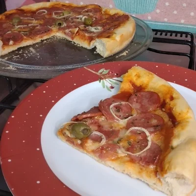 Recette de pizza maison facile sur le site de recettes DeliRec