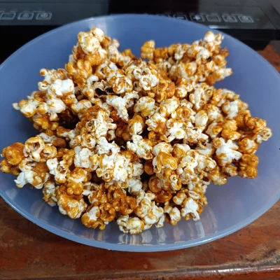 Recette de Popcorn chaud au beurre recouvert de sucre sur le site de recettes DeliRec