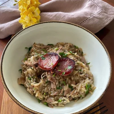 Recipe of Classic Portuguese duck rice on the DeliRec recipe website