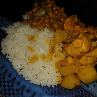 Recipe of Chicken cooked in cubes with rice and beans on the DeliRec recipe website